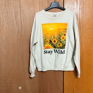 Wound Up Cream Sweatshirt with Yellow Sunflower Graphic